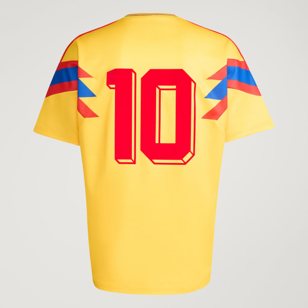 https://assets.adidas.com/images/w_600,f_auto,q_auto/44177c82221249ebae75b869e2a1615b_9366/Camisa_II_Selecao_da_Colombia_1990_Amarelo_JN3713_HM6.jpg